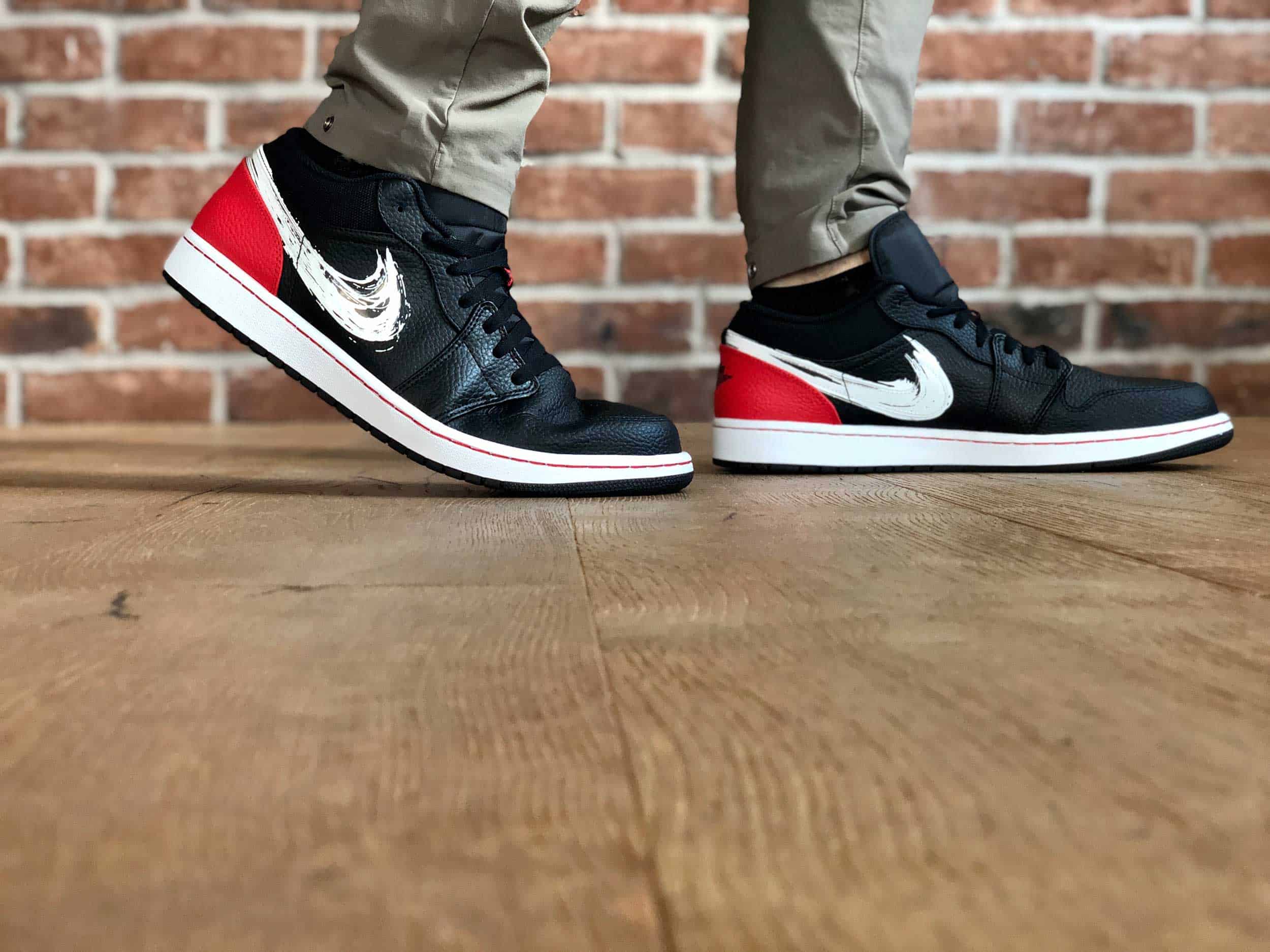 jordan 1 low painted swoosh